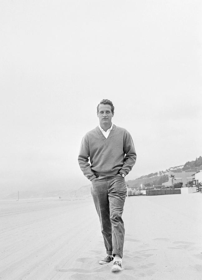 Paul Newman Walking along a beach