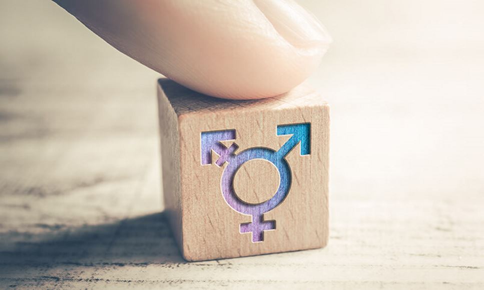 transgender symbol on wooden block